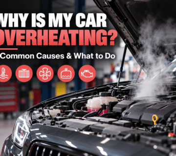 Car engine overheating with steam rising from the bonnet, illustrating common cooling system problems and engine overheating warning signs.